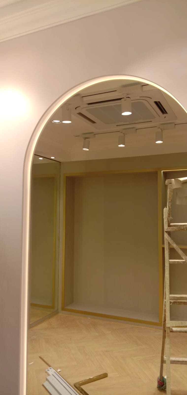 Showroom Gold Fluted Archways & Polished Flooring